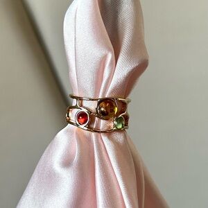 Open back adjustable ring